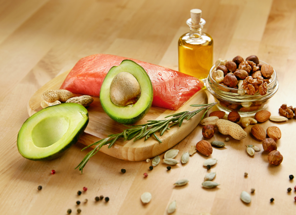 Foods containing unsaturated fats such as salmon, avocado, nuts and olive oil
