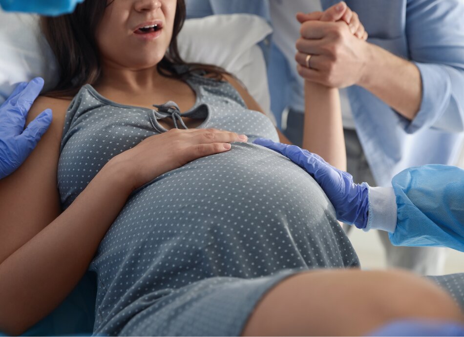 Pregnant woman in labour having pain