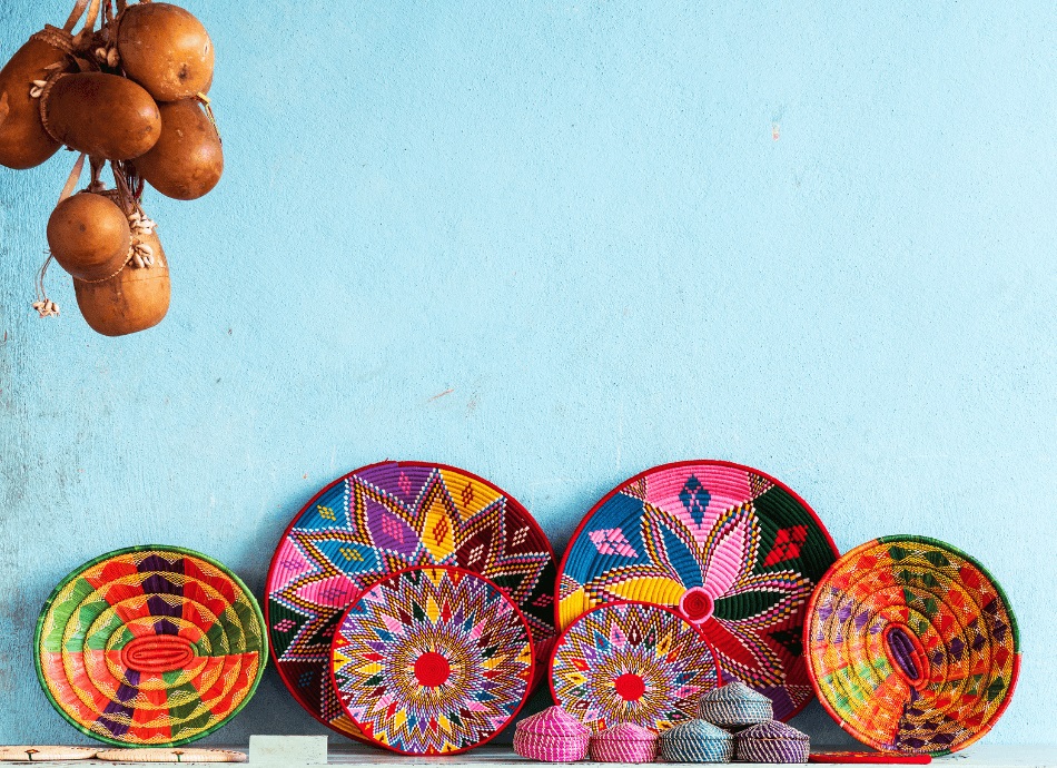 Ethiopian craft against blue wall 