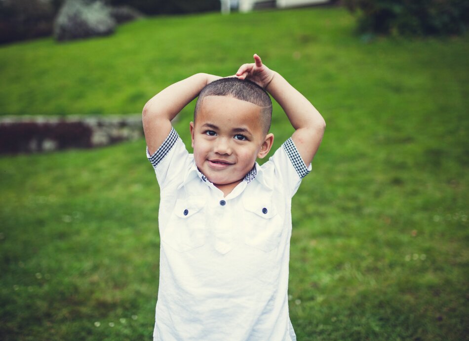 Young Maori boy in garden canva 950x690