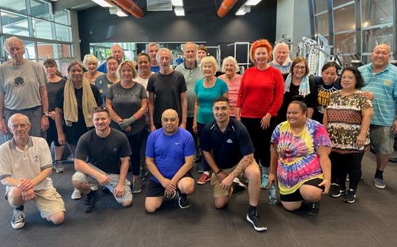 Group of people attending the new green prescription programme posing for camera